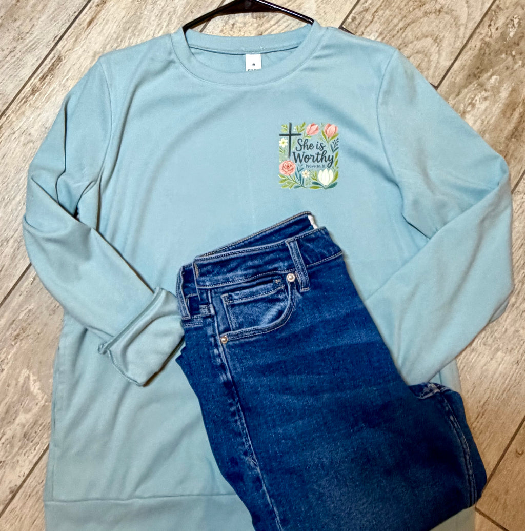 “She Is Worthy” Soft Blue Sweatshirt | Floral Cross Graphic