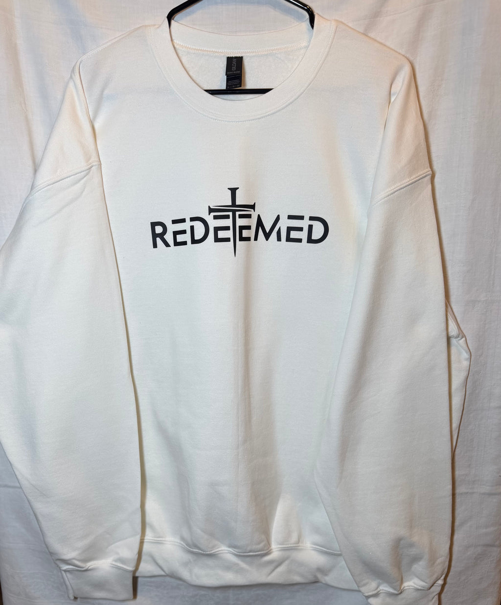 “Redeemed” Cross Sweatshirt | White