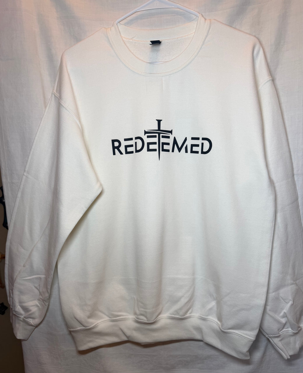 “Redeemed” Cream Crewneck Sweatshirt | Minimal Faith Graphic