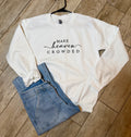 “Redeemed” Cream Crewneck Sweatshirt | Minimal Faith Graphic