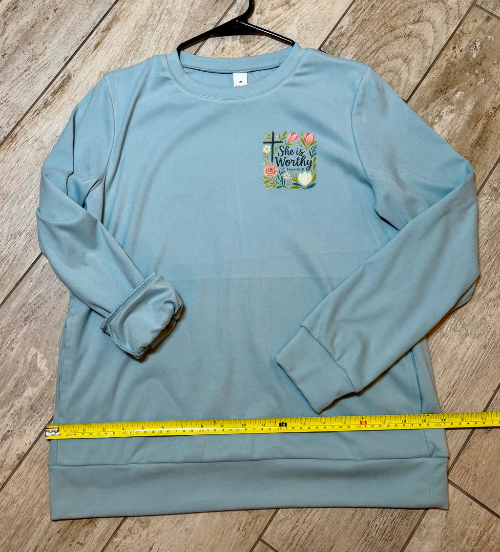 “She Is Worthy” Soft Blue Sweatshirt | Floral Cross Graphic