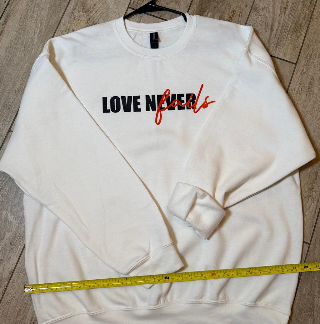 “Love Never Fails” Statement Sweatshirt | White
