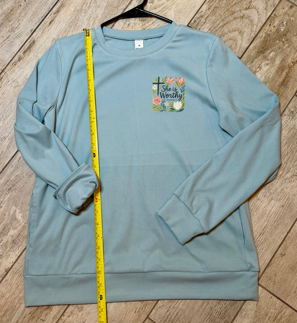 “She Is Worthy” Soft Blue Sweatshirt | Floral Cross Graphic