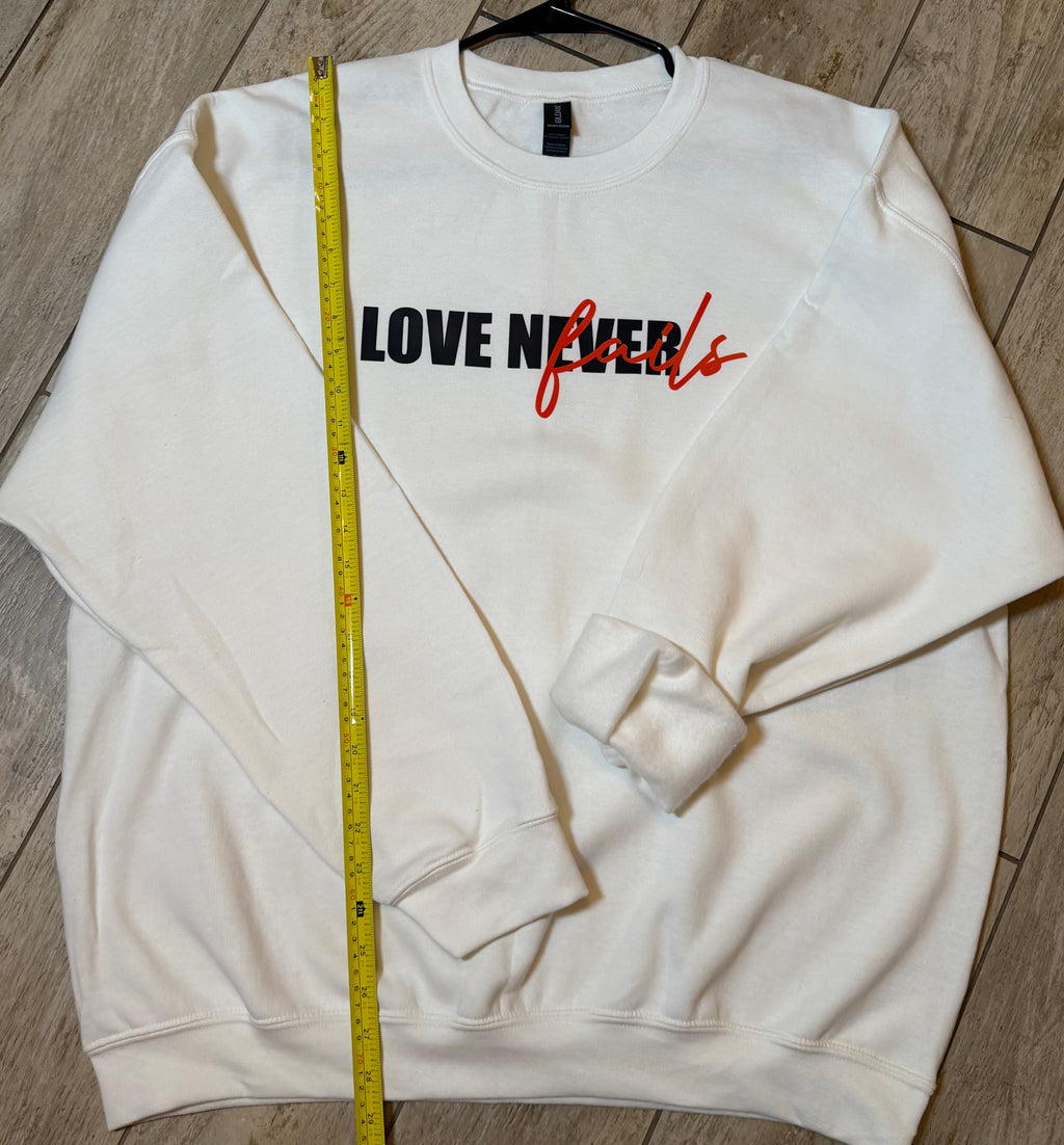“Love Never Fails” Statement Sweatshirt | White